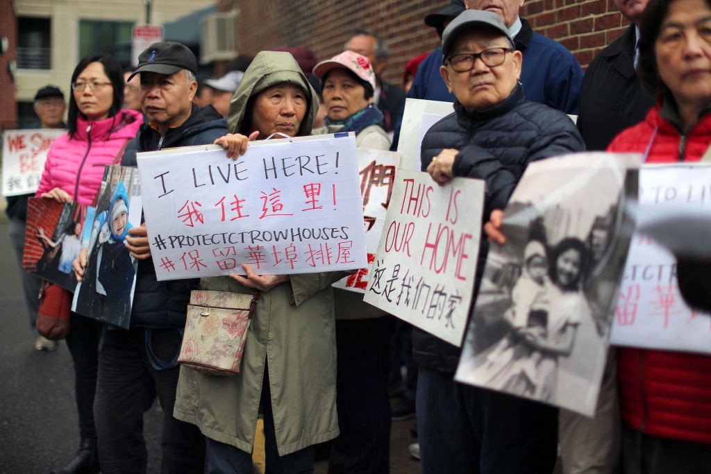 Asian-Americans
							protest the gentrification of their neightborhoods